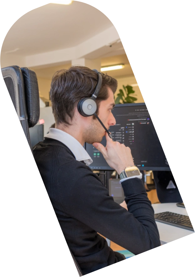 Mask group (28) Our team member providing IT support to a customer