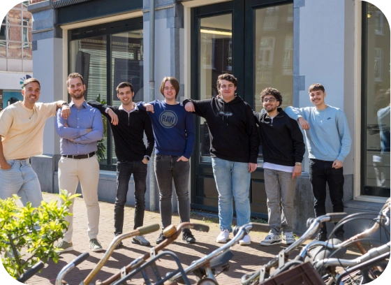 Mask group (32) Cloudconnected Team in front of the Amsterdam office