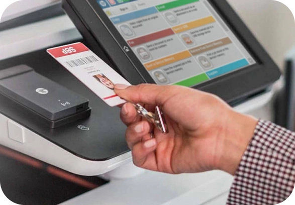 image 37 Person using a badge to authenticate at a printer.